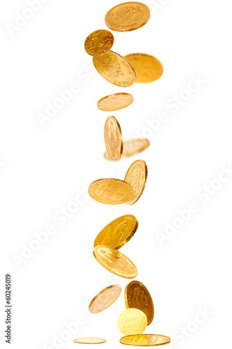 Photo: Heap of falling old gold coins isolated on white Heap of falling old gold coins isolated on white