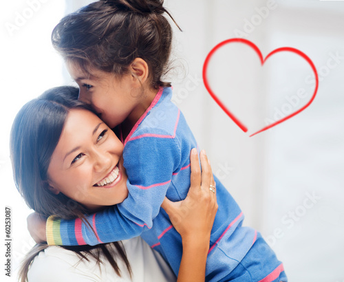Photo: hugging mother and daughter hugging mother and daughter