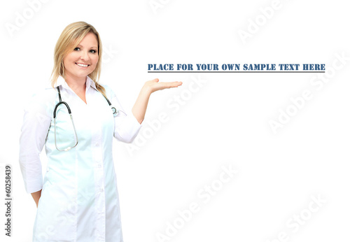Photo: Young beautiful doctor with stethoscope isolated on white Young beautiful doctor with stethoscope isolated on white
