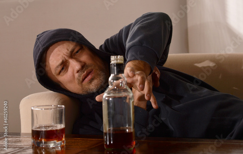 Photo: Man drinks whiskey Man drinks whiskey