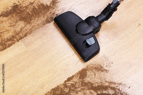 Photo: Vacuuming floor in house Vacuuming floor in house