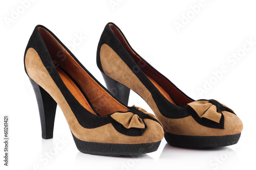Photo: Woman shoes isolated on white. Nice woman shoes Woman shoes isolated on white. Nice woman shoes