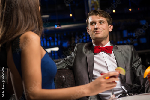 Photo: portrait of a man in a nightclub portrait of a man in a nightclub
