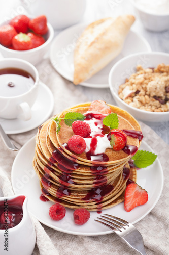 Photo: pancakes with berry and jam for breakfast pancakes with berry and jam for breakfast