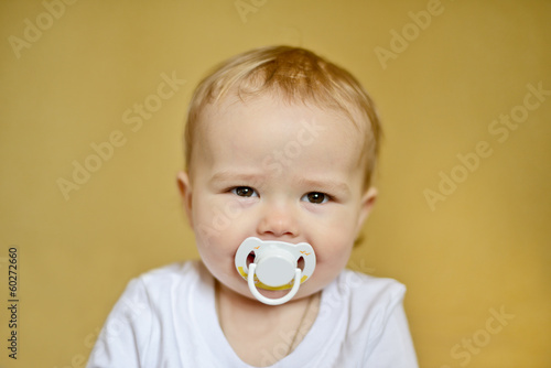 Photo: baby with pacifier baby with pacifier