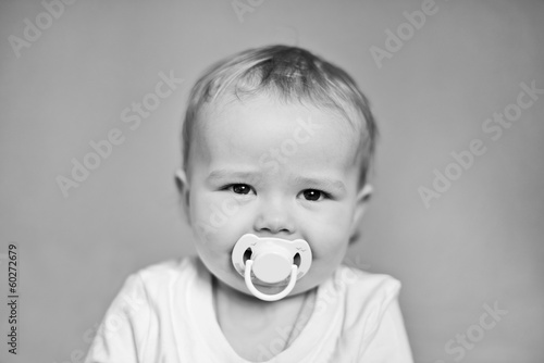 Photo: baby with pacifier baby with pacifier