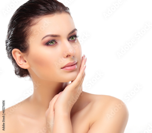Photo: Beautiful Girl Touching Her Face. Beauty Face.Makeup Beautiful Girl Touching Her Face. Beauty Face.Makeup