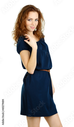 Photo: Beautiful young girl in dress isolated on white Beautiful young girl in dress isolated on white