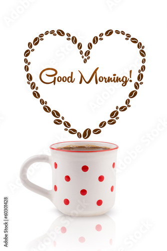Photo: Coffee mug with coffee beans shaped heart with good morning sign Coffee mug with coffee beans shaped heart with good morning sign