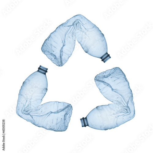 Photo: Concept of recycle.Empty used plastic bottle on white background Concept of recycle.Empty used plastic bottle on white background