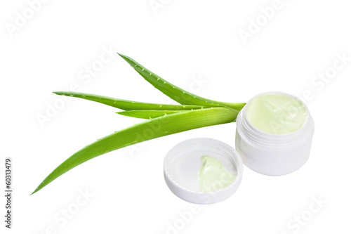 Photo: Jar of cream and aloe leaves. Isolate on white background Jar of cream and aloe leaves. Isolate on white background