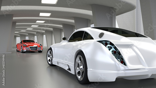 zwei Wagen in futuristischer Garage
