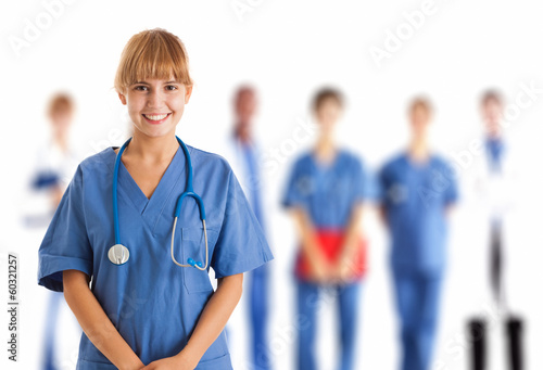 Photo: Nurse in front of her medical team Nurse in front of her medical team