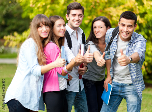Photo: Group of students showing ok sign Group of students showing ok sign