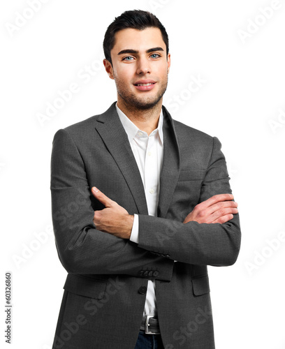 Photo: Confident businessman isolated on white Confident businessman isolated on white