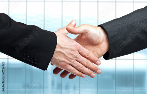 Photo: Business people shaking hands Business people shaking hands