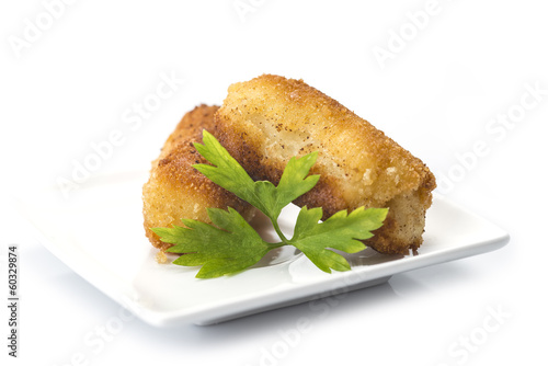 Photo: Tapa de croquetas caseras de bacalao aisladas sobre blanco Tapa de croquetas caseras de bacalao aisladas sobre blanco