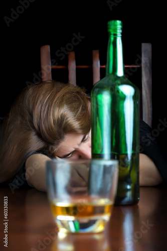 Photo: Asleep drunk alcoholic woman Asleep drunk alcoholic woman