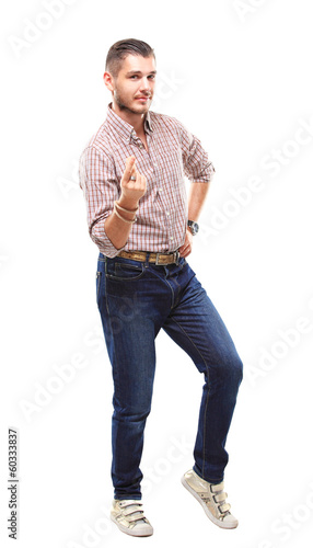 Photo: Smiling man pointing his finger to you Smiling man pointing his finger to you