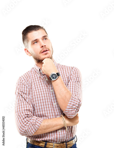 Photo: Thinking man isolated on white. businessman looking up Thinking man isolated on white. businessman looking up
