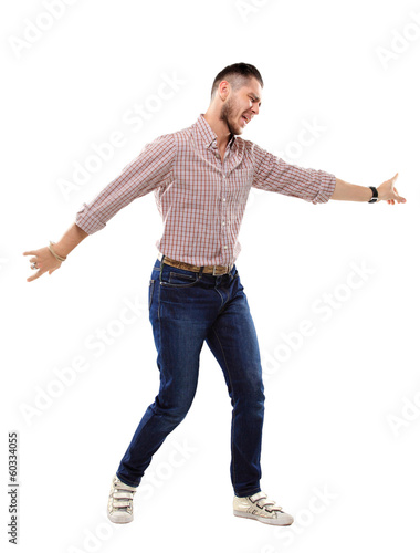 Photo: happy young man celebrating success on white background happy young man celebrating success on white background