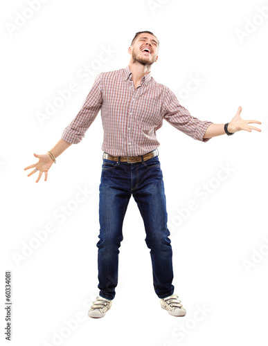 Photo: happy young man celebrating success on white background happy young man celebrating success on white background