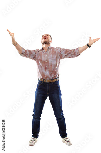Photo: happy young man celebrating success on white background happy young man celebrating success on white background