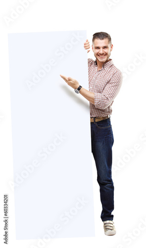Photo: Happy business man presenting your text isolated on white Happy business man presenting your text isolated on white