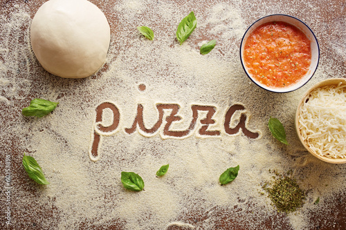 Photo: Pizza word written on table Pizza word written on table