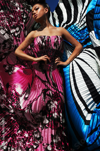 Photo: Mighty Colors. Colorful fashion model in beauty dress. Mighty Colors. Colorful fashion model in beauty dress.