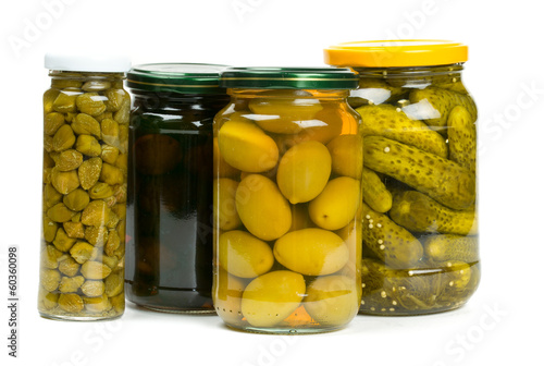 Photo: jars of pickles, capers and olives jars of pickles, capers and olives