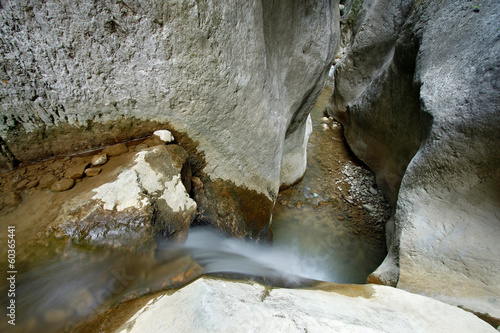 Photo: A small waterfall and flowing water and form some narrow gorges A small waterfall and flowing water and form some narrow gorges