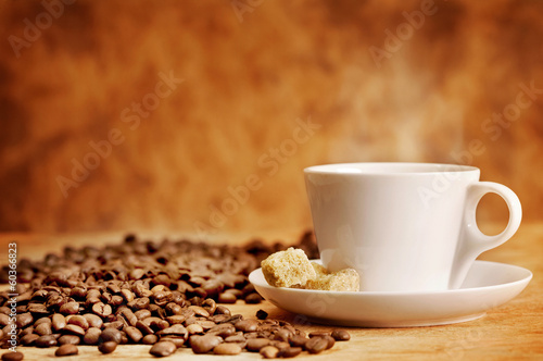Photo: Coffee cup and roasted beans Coffee cup and roasted beans