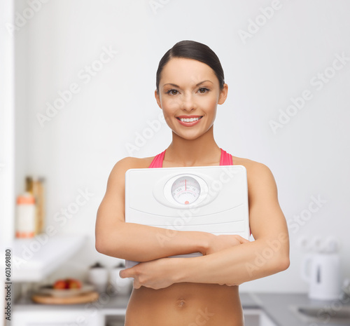 Photo: woman with scale woman with scale