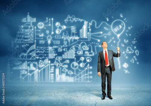 Photo: Businessman and business sketch Businessman and business sketch