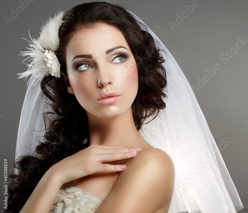 Photo: Wedding. Quiet Bride in Classic White Veil Looking Away Wedding. Quiet Bride in Classic White Veil Looking Away