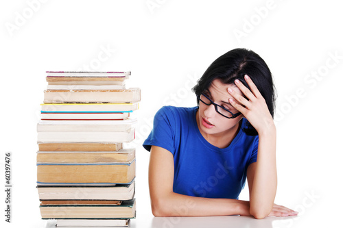 Photo: Sad female student with learning difficulties Sad female student with learning difficulties