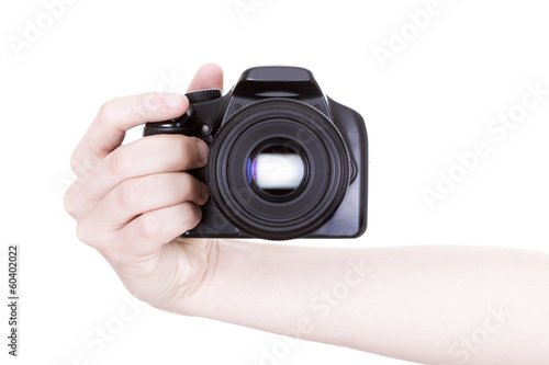 Photo: holding a digital camera holding a digital camera