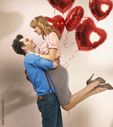 Photo: Attractive couple enjoying each other Attractive couple enjoying each other