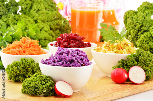 Photo: Composition with four vegetable salad bowls Composition with four vegetable salad bowls
