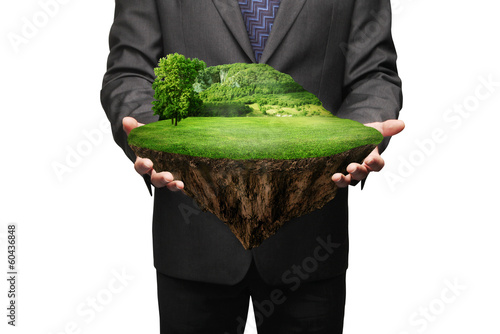 Photo: man holding island man holding island