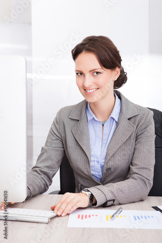 Photo: Smiling Young Businesswoman Smiling Young Businesswoman