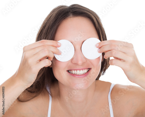 Photo: Woman Cleaning Face With Cotton Woman Cleaning Face With Cotton