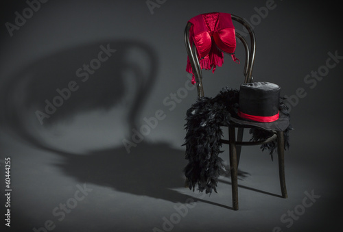 Photo: On retro chair is a cabaret dancer clothing. On retro chair is a cabaret dancer clothing.