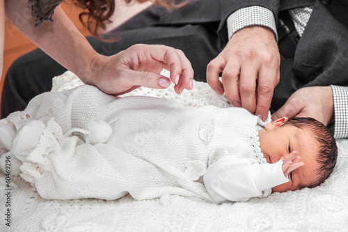 Photo: Dressing up a baby Dressing up a baby