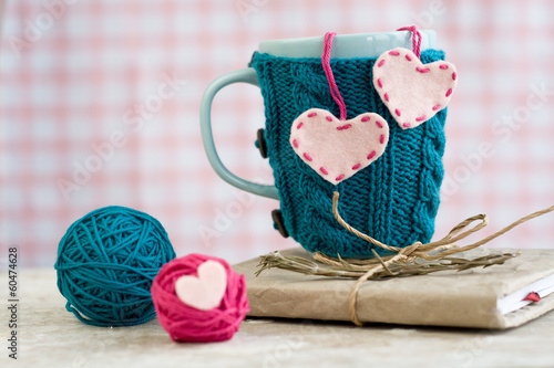 Photo: Blue cup in a blue sweater with felt hearts Blue cup in a blue sweater with felt hearts