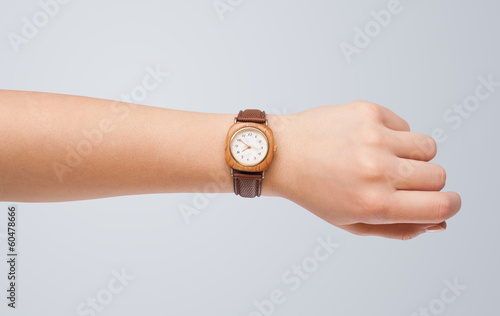 Photo: Hand with watch showing precise time Hand with watch showing precise time