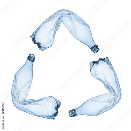 Photo: Concept of recycle.Empty used plastic bottle on white background Concept of recycle.Empty used plastic bottle on white background