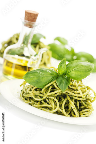 Photo: delicious italian pasta with pesto sauce delicious italian pasta with pesto sauce