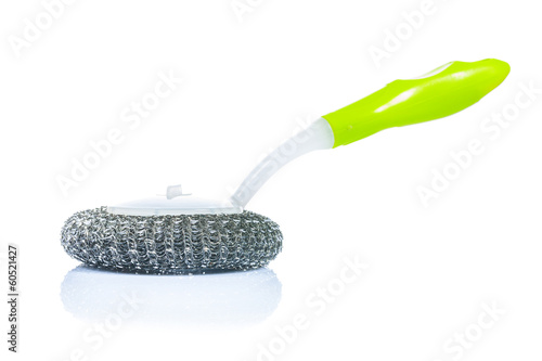 Photo: kitchen scrubbrush with green handle isolated kitchen scrubbrush with green handle isolated